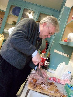 President Barszcz carving at Homecoming 
feast Nov.23,2008